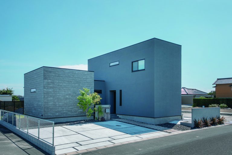 グレーのキューブが2つ並んだ家